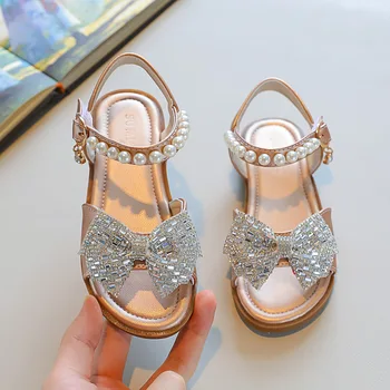 Сандали за момичета 2022 Лято Нови плоски детски сандали Мода лък кристали сватба принцеса обувки студентско шоу танц обувка H58