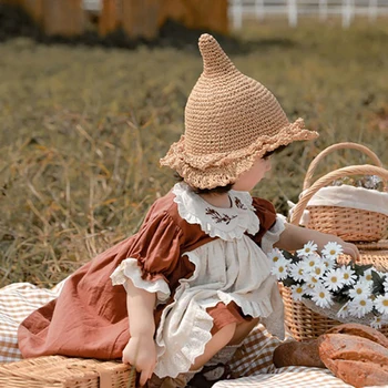 1Pc Детски слънчеви шапки Лятна слама плетена рибарска шапка Момче момиче Плътен цвят слънцезащитна шапка Широка периферия плажна шапка парти вещица